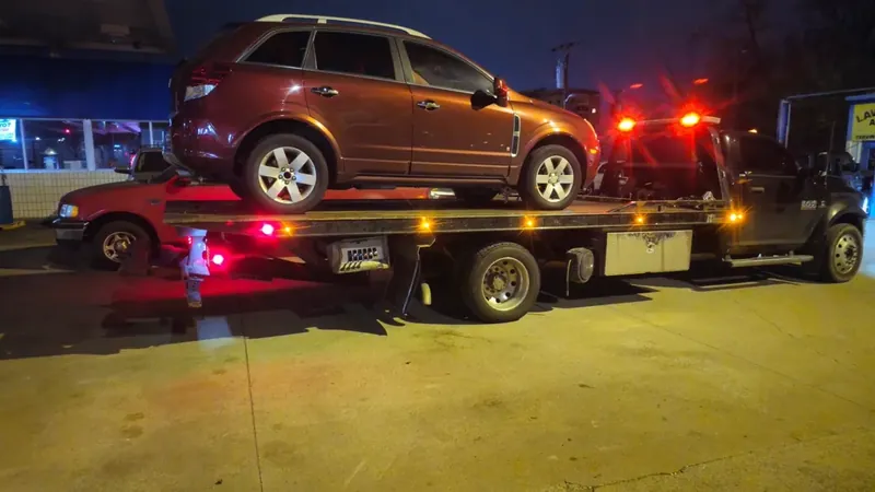 Off-road recovery towing in Nashville TN — 4x4 winch-out pulling a stuck vehicle from mud