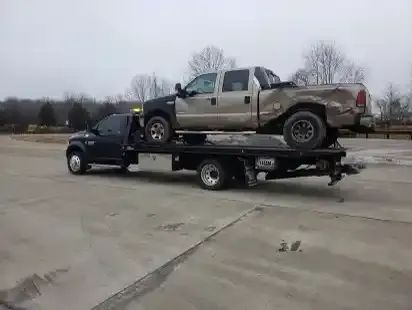 Wrecked pickup truck loaded on a flatbed in Nashville